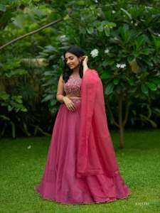 rajisha-vijayan-in-classic-three-piece-magenta-lehenga-set-sleeveless-cropped-blouse-with-intricate-floral-embroidery-photos-005