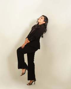 rajisha-vijayan-in-contemporary-3-piece-tailored-pantsuit-ensemble-with-black-structured-single-breasted-blazer