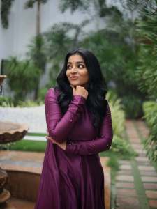 rajisha-vijayan-in-deep-purple-long-Anarkali-kurta-featuring-a-high-round-neck-full-length-fitted-sleeves-dress-photos-001