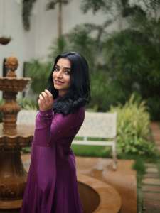rajisha-vijayan-in-deep-purple-long-Anarkali-kurta-featuring-a-high-round-neck-full-length-fitted-sleeves-dress-photos