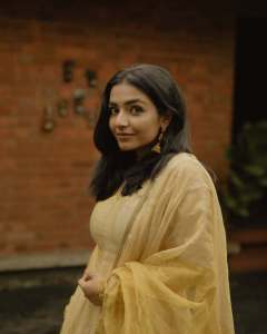 rajisha-vijayan-in-golden-colour-lehenga-for-party-outfit-007