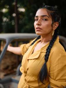 rajisha-vijayan-in-mustard-yellow-utility-style-jumpsuit-photos-001