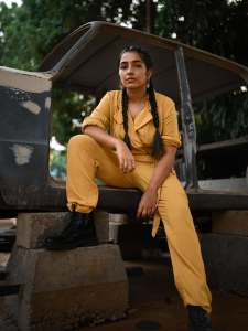 rajisha-vijayan-in-mustard-yellow-utility-style-jumpsuit-photos-002