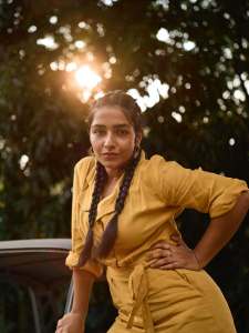 rajisha-vijayan-in-mustard-yellow-utility-style-jumpsuit-photos-003