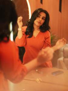 rajisha-vijayan-in-orange-colour-jugalbandi-outfit-photos-002