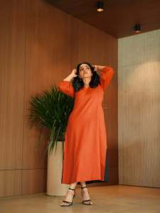 rajisha-vijayan-in-orange-colour-jugalbandi-outfit-photos-003