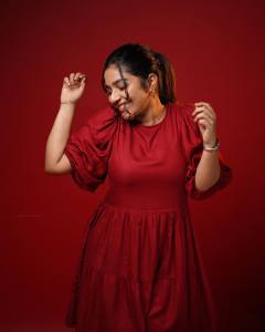 rajisha-vijayan-in-red-frock-photoshoot-003