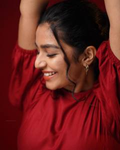 rajisha-vijayan-in-red-frock-photoshoot-005