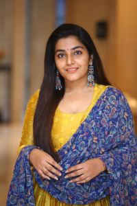 rajisha-vijayan-new-photos-in-yellow-churidar-001