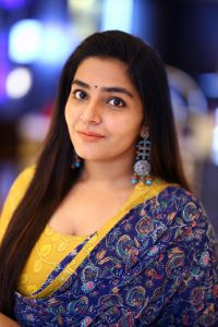 rajisha-vijayan-new-photos-in-yellow-churidar-003