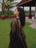 Actress-Rajisha-Vijayan-A-fitted-sleeveless-V-neck-crop-top-and-dark-Lehenga-photos-003