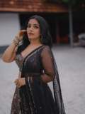 Actress-Rajisha-Vijayan-A-fitted-sleeveless-V-neck-crop-top-and-dark-Lehenga-photos-005