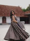Actress-Rajisha-Vijayan-A-fitted-sleeveless-V-neck-crop-top-and-dark-Lehenga-photos-006