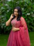 rajisha-vijayan-in-classic-three-piece-magenta-lehenga-set-sleeveless-cropped-blouse-with-intricate-floral-embroidery-photos-003