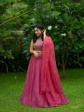 rajisha-vijayan-in-classic-three-piece-magenta-lehenga-set-sleeveless-cropped-blouse-with-intricate-floral-embroidery-photos-005