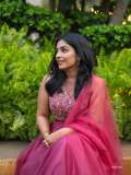 rajisha-vijayan-in-classic-three-piece-magenta-lehenga-set-sleeveless-cropped-blouse-with-intricate-floral-embroidery-photos-008