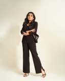 rajisha-vijayan-in-contemporary-3-piece-tailored-pantsuit-ensemble-with-black-structured-single-breasted-blazer-004