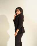 rajisha-vijayan-in-contemporary-3-piece-tailored-pantsuit-ensemble-with-black-structured-single-breasted-blazer-005