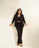 rajisha-vijayan-in-contemporary-3-piece-tailored-pantsuit-ensemble-with-black-structured-single-breasted-blazer-006