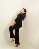 rajisha-vijayan-in-contemporary-3-piece-tailored-pantsuit-ensemble-with-black-structured-single-breasted-blazer