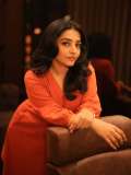 rajisha-vijayan-in-orange-colour-jugalbandi-outfit-photos-001