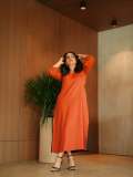 rajisha-vijayan-in-orange-colour-jugalbandi-outfit-photos-003