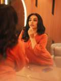 rajisha-vijayan-in-orange-colour-jugalbandi-outfit-photos-005