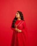 rajisha-vijayan-in-vibrant-red-full-sleeve-flared-Anarkali-styling-with-Traditional-gold-jhumkas-and-statement-rings-photos-007