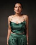 rajisha-vijayan-glamorous-photoshoot-in-Charlotte-Pleated-Christmas-Green-Trouser-with-Satin-Finish-Top-001