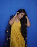 rajisha-vijayan-in-yellow-a-line-top-with-blue-style-dress-images-002