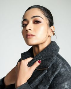 rashmika-mandanna-in-Striped-Straight-Skirt-and-top-dress-with-Knee-High-Opaque-Stockings-photos