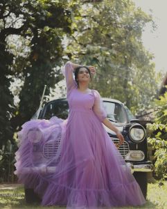 ramya-nambeesan-photos-in-purple-colour-gown-003