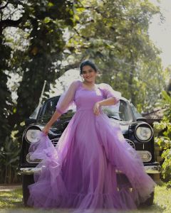 ramya-nambeesan-photos-in-purple-colour-gown-005