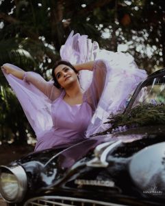 ramya-nambeesan-photos-in-purple-colour-gown