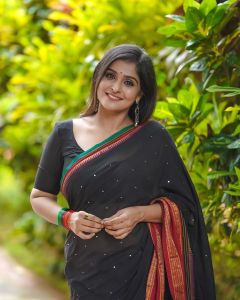 remya-nambeesan-new-photos-in-black-saree-004
