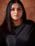 remya-nambeesan-in-black-outfit-paired-with-snake-themed-earrings-photos-001