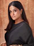 remya-nambeesan-in-black-outfit-paired-with-snake-themed-earrings-photos-003