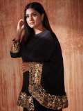 remya-nambeesan-in-black-outfit-paired-with-snake-themed-earrings-photos