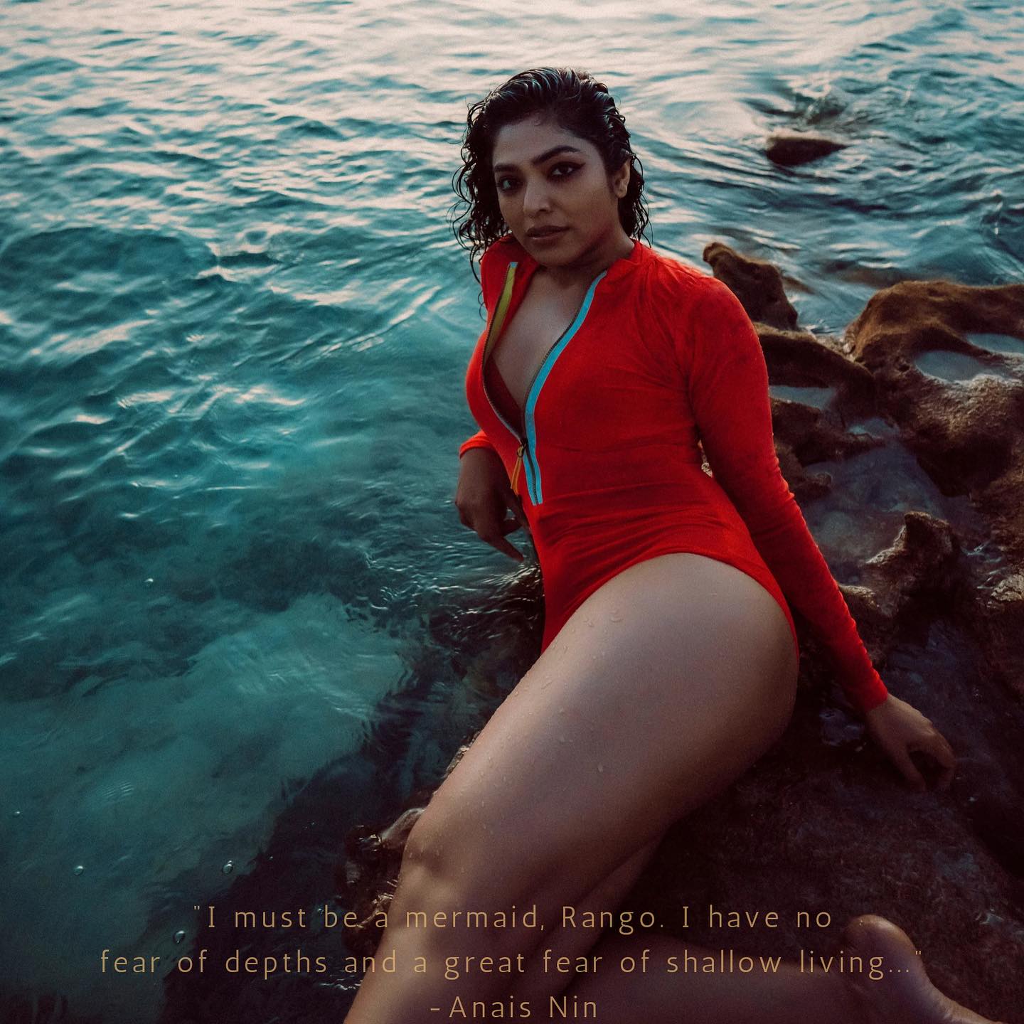 1_actress-rima-kallingal-new-images-in-red-Zipper-Body-Suit-005