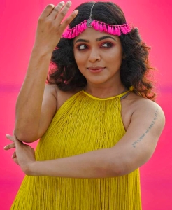 rima-kallingal-latest-photos-in-yellow-dress-002
