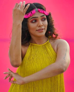rima-kallingal-latest-photos-in-yellow-dress-003
