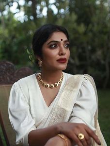 rima-kallingal-latest-photoshoot-in-onam-dress-003