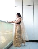 rima-kallingal-photos-in-saree-with-sleeveless-blouse-ideas-photos-008