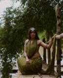 actress-rima-kallingal-latest-pics-in-tribal-style-dress-without-blouse-005