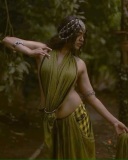actress-rima-kallingal-latest-pics-in-tribal-style-dress-without-blouse-007