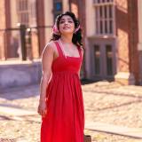 rima-kallingal-in-summer-wear-fit-and-flare-red-dress-photos-003