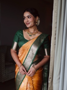 saniya-iyappan-in-mango-yellow-and-green-compo-saree-photos-003