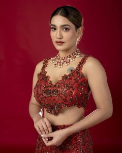 saniya-iyappan-in-red-fish-cut-lehenga-photos-003