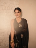 kalyani-song-actress-saniya-iyappan-in-black-saree-photos