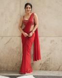 saniya-iyappan-in-red-chiffon-saree-photos-003